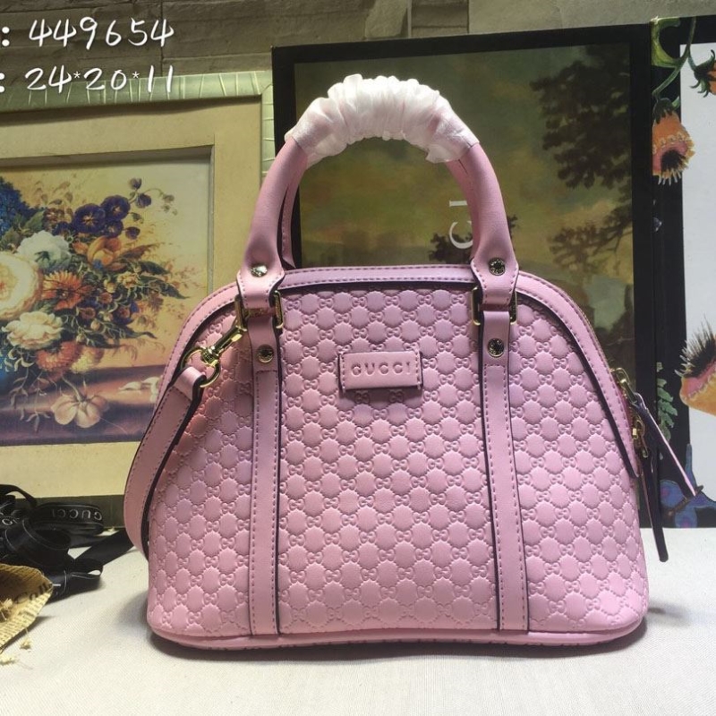 G*u*i top handle bags